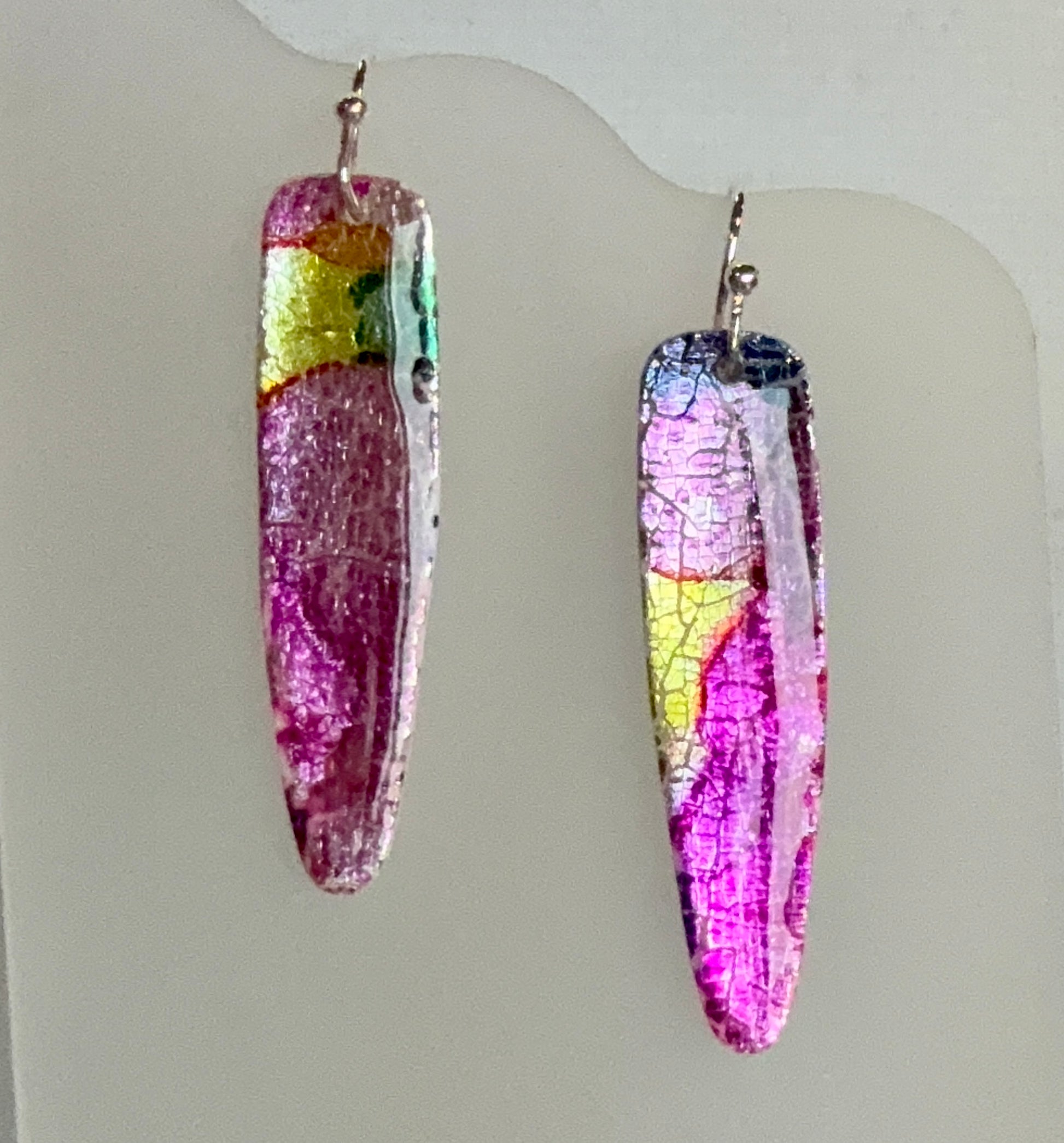 Polymer Clay dangles on hypoallergic wires. Sparkle and shine with silver leaf and inks