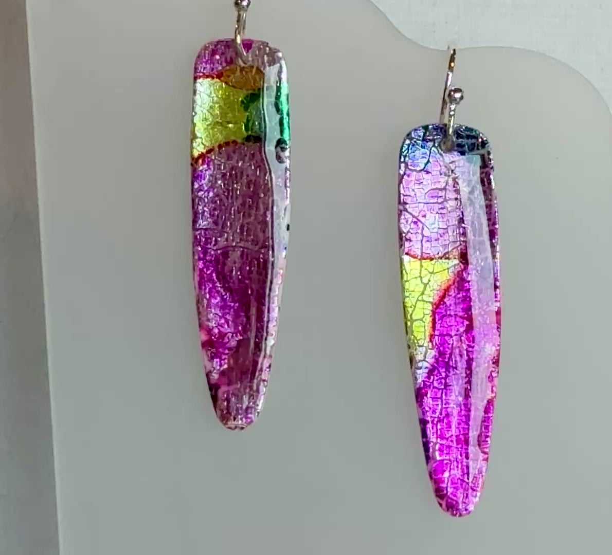 Polymer Clay dangles on hypoallergic wires. Sparkle and shine with silver leaf and inks